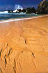 Receding Wave Carves Beach Sand (63404 bytes)